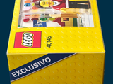 yellow box of legos on a blue background with a blue background
