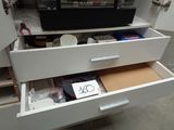 a drawer that has a lot of items inside of it