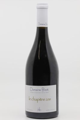 une bouteille de vin rouge avec une étiquette dessus