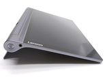 a close up of a laptop on a white surface
