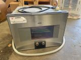 l'image d'une machine à laquelle est attaché un tuyau