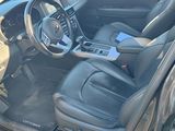 the interior of a car with a steering wheel, dashboard, and center console
