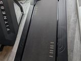 a close up of a tread on a tread machine in a room