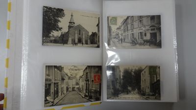 a picture of a book opened to show pictures of old buildings