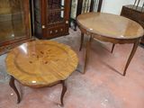 two tables and a cabinet in a room