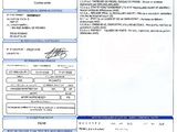 a close up of a document with a picture of a person on it