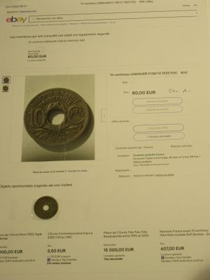 une photo d'une page sur laquelle figure l'image d'une pièce de monnaie