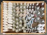a wooden box filled with bottles of water and toothbrushes