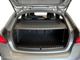 the back of a car with its trunk open and the back of the trunk open