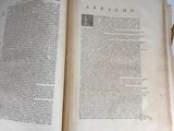 an open book that is sitting on a table