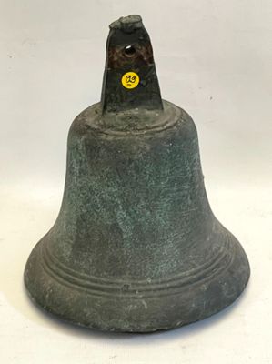 une cloche sur laquelle est dessiné un smiley