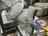 a machine that is sitting on a counter in a kitchen