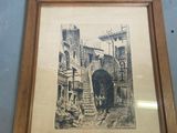 two framed pictures on the wall next to each other