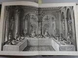 an open book with a drawing of a dining room