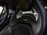the interior of a car with black leather seats and black leather trims