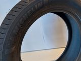 a close up of a tire on a white surface