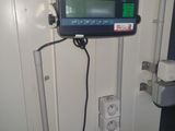 an image of a digital device mounted on a door