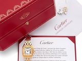 an image of a cartier watch in a red box with a note