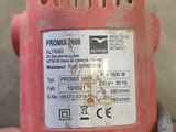 a red blower that has a sticker on it