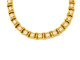 an image of a gold chain bracelet with pink beads