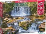 the puzzle box has a picture of a waterfall in the woods