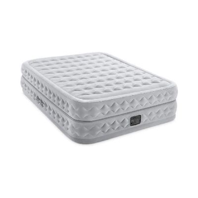 a close up of a mattress on a white surface