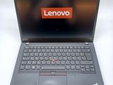 the lenovo laptop is open and ready to be used