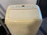 a washing machine that is sitting on the floor