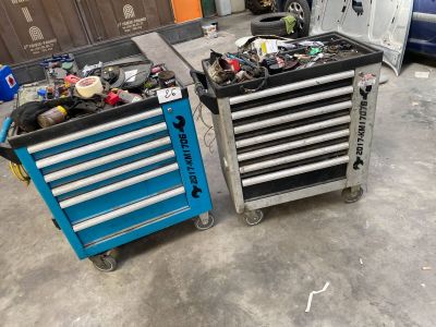 two tool boxes and a tool cart in a garage