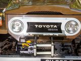 a toyota truck with a winch on the back of it