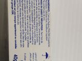 the back of a box of toothpaste sitting on top of a table