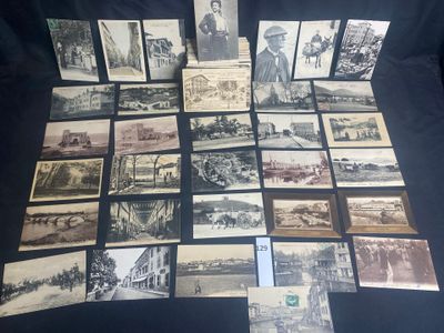 several old black and white photographs of people and buildings on a table