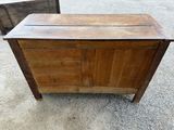pair of antique wooden chests with drawers on top of them