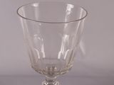 a clear glass cup sitting on top of a table