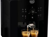 gros plan d'une machine à café avec deux tasses de café