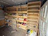 a garage with a lot of shelves and a lot of boxes