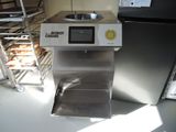 a machine that is sitting on a counter in a kitchen
