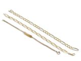 three gold and silver chain bracelets on a white background