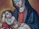 une image d'une peinture représentant une femme tenant un bébé