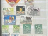 a picture of a picture of a collection of stamps on a wall