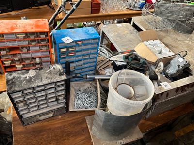 a lot of tools on a workbench in a workshop