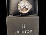 an image of a watch in a box on a black background