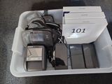 a container with a lot of electronic items in it