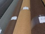 many different colors of carpet on display in a store