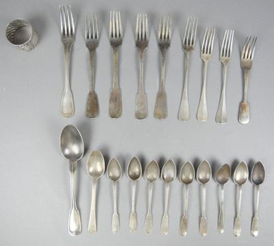a lot of silver spoons and spoon spoons on a table