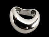 a close up of a silver ring on a black background