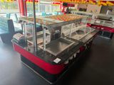 a buffet with many different types of food on it