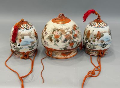 three eggs that are sitting on a table