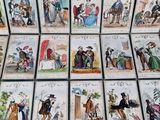 a lot of cards that have pictures of people on them