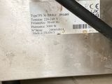 a close up of a piece of metal with a barcode on it